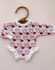 Snuggle Hearts Knit Ruffle Romper