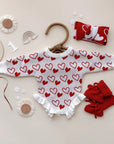 Snuggle Hearts Knit Ruffle Romper