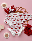 Snuggle Hearts Knit Ruffle Romper